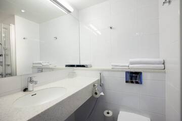 Фото номера Стандартный двухместный номер с 2 отдельными кроватями Отель Scandic Kuopio г. Куопио 12