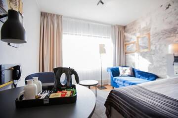 Фото номера Улучшенный двухместный номер с 1 кроватью Отель Scandic Kuopio г. Куопио 5