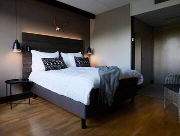 Фото номера Стандартный двухместный номер с 1 кроватью Отель Lapland Hotels Kuopio г. Куопио 2