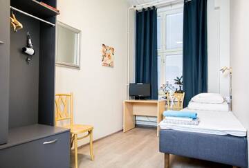 Фото номера Одноместный номер с общей ванной комнатой Хостелы Hostel Hermanni г. Куопио 3
