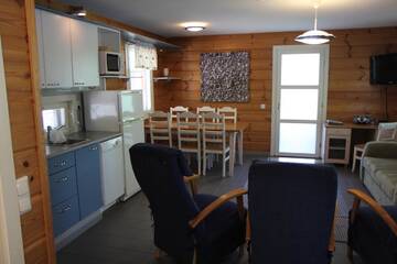 Фото номера Вилла с 3 спальнями и сауной Курортные отели Rauhalahti Holiday Homes г. Куопио 13