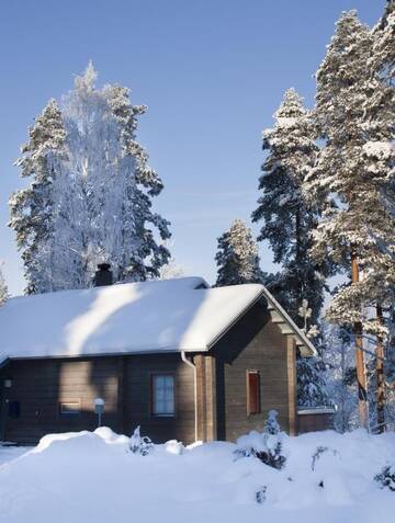 Фото номера Вилла с двумя спальнями и сауной. Курортные отели Rauhalahti Holiday Homes г. Куопио 19
