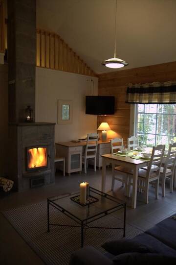 Фото номера Вилла с двумя спальнями и сауной. Курортные отели Rauhalahti Holiday Homes г. Куопио 17