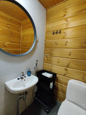 Фото номера Вилла с 3 спальнями и сауной Курортные отели Rauhalahti Holiday Homes г. Куопио 6