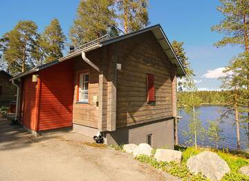 Фото номера Вилла с 3 спальнями и сауной Курортные отели Rauhalahti Holiday Homes г. Куопио 11