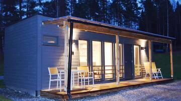 Фото номера Улучшенное шале Курортные отели Rauhalahti Holiday Homes г. Куопио 3