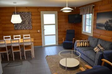 Фото номера Вилла с 3 спальнями и сауной Курортные отели Rauhalahti Holiday Homes г. Куопио 8