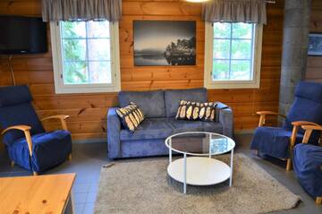 Фото номера Вилла с 3 спальнями и сауной Курортные отели Rauhalahti Holiday Homes г. Куопио 9
