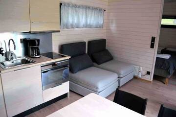 Фото номера Улучшенное шале Курортные отели Rauhalahti Holiday Homes г. Куопио 7