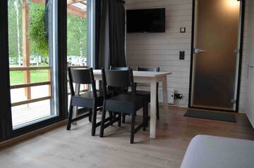 Фото номера Улучшенное шале Курортные отели Rauhalahti Holiday Homes г. Куопио 9