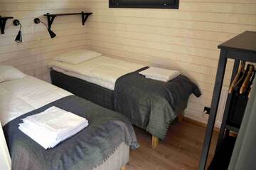 Фото номера Улучшенное шале Курортные отели Rauhalahti Holiday Homes г. Куопио 11