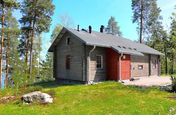 Фото номера Вилла с двумя спальнями и сауной. Курортные отели Rauhalahti Holiday Homes г. Куопио 4
