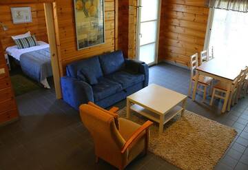 Фото номера Вилла с двумя спальнями и сауной. Курортные отели Rauhalahti Holiday Homes г. Куопио 25