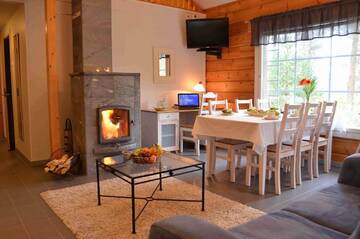 Фото номера Вилла с двумя спальнями и сауной. Курортные отели Rauhalahti Holiday Homes г. Куопио 5