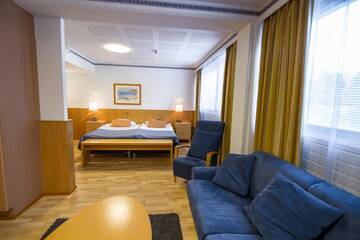 Фото номера Люкс с сауной Отель Economy Hotel Savonia г. Куопио 2