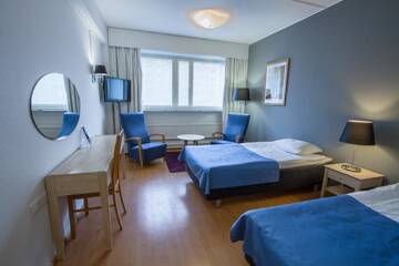 Фото номера Двухместный номер эконом-класса с 2 отдельными кроватями Отель Economy Hotel Savonia г. Куопио 5