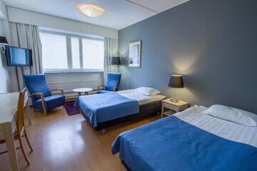 Фото номера Двухместный номер эконом-класса с 2 отдельными кроватями Отель Economy Hotel Savonia г. Куопио 6