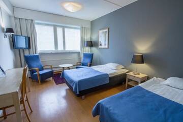 Фото номера Двухместный номер эконом-класса с 2 отдельными кроватями Отель Economy Hotel Savonia г. Куопио 8