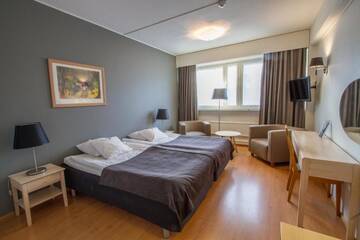 Фото номера Двухместный номер эконом-класса с 2 отдельными кроватями Отель Economy Hotel Savonia г. Куопио 14