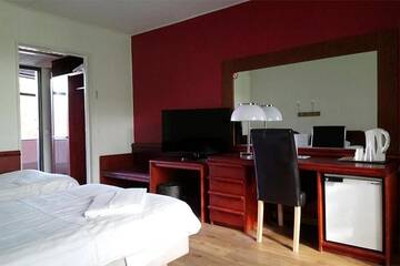 Фото номера Стандартный одноместный номер Отель Finlandia Hotel Isovalkeinen г. Куопио 7