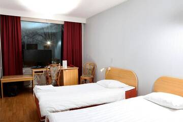 Фото номера Одноместный номер эконом-класса Отель Finlandia Hotel Isovalkeinen г. Куопио 2