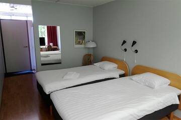 Фото номера Одноместный номер эконом-класса Отель Finlandia Hotel Isovalkeinen г. Куопио 4